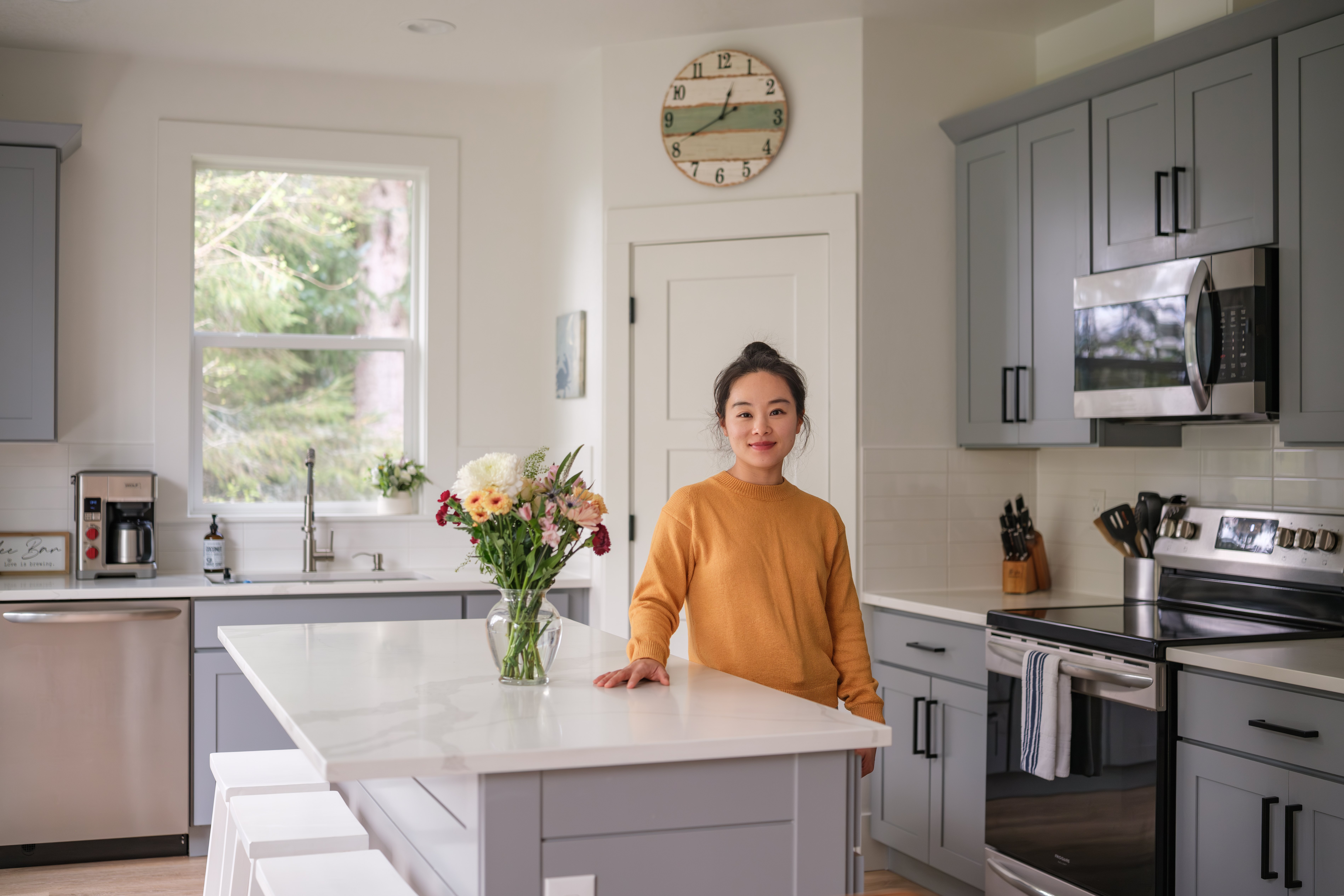 Angela in the kitchen of one of her short-term rentals